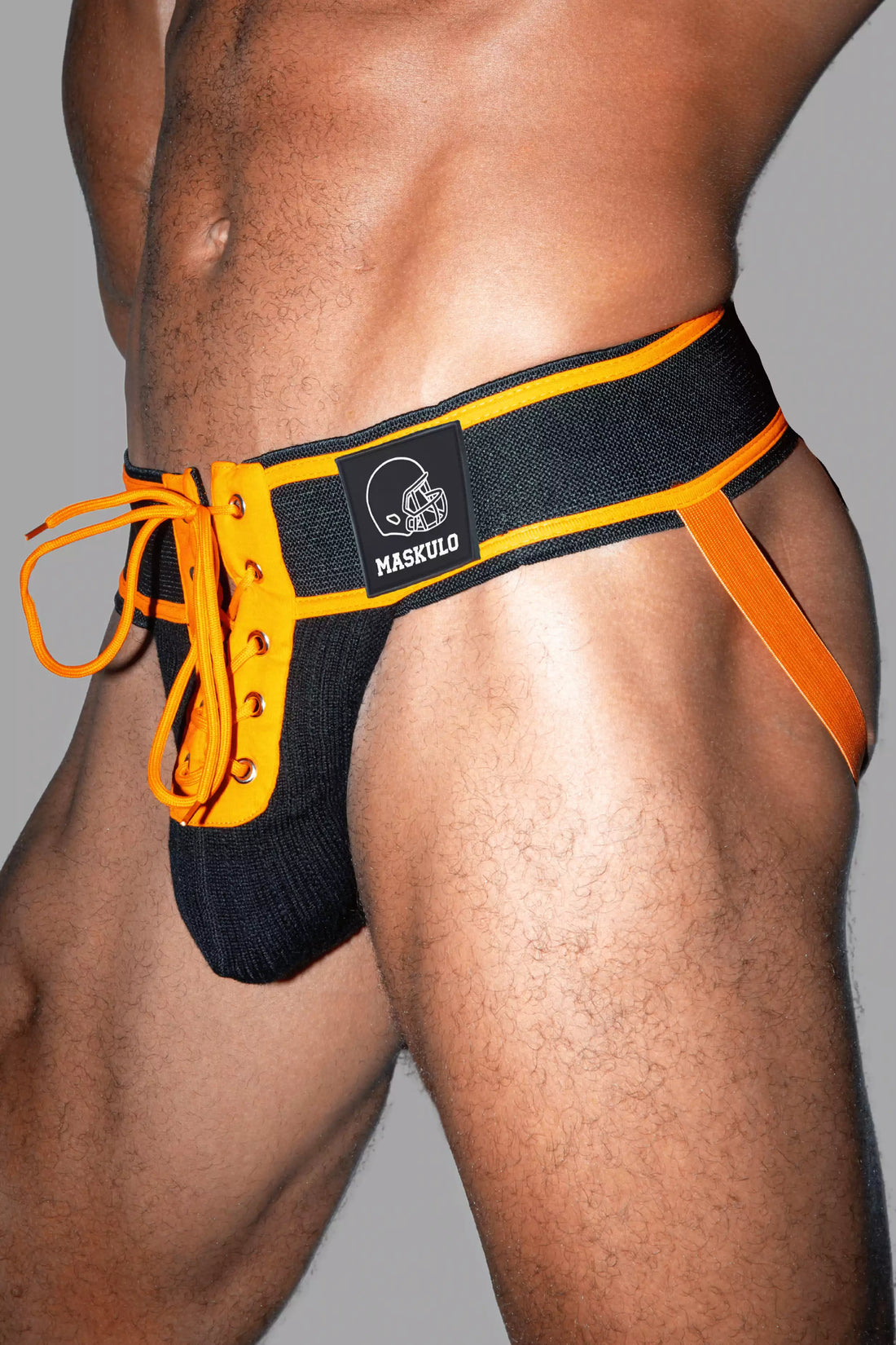 Matt Gridd-Iron, American Football Jockstrap. Schwarz + Orange