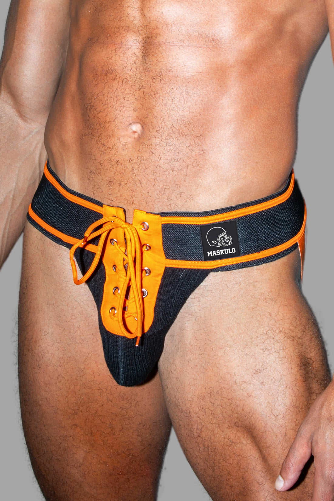 Matt Gridd-Iron, American Football Jockstrap. Schwarz + Orange