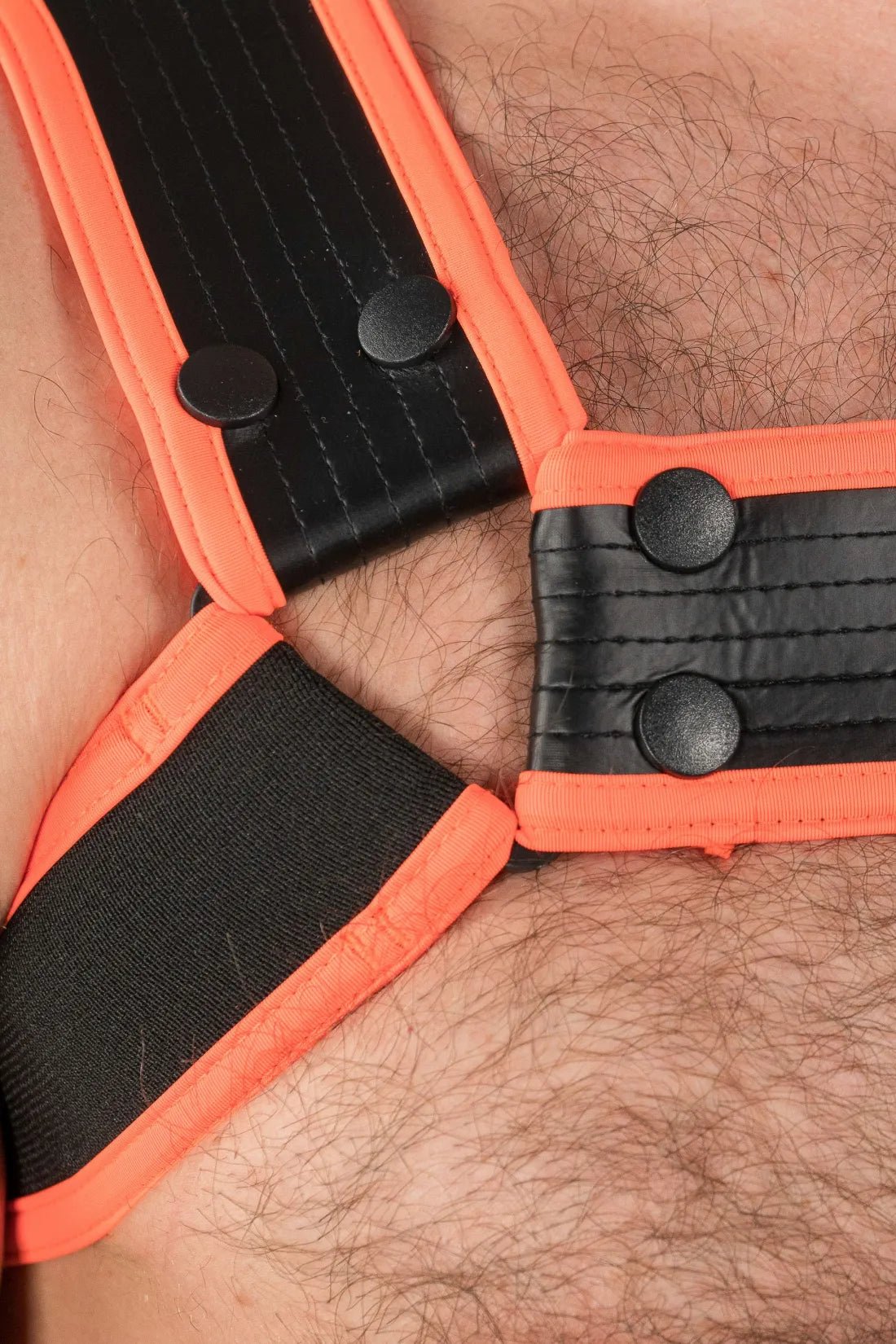 Outtox by Maskulo Bulldog Harness with Snaps in Black and Orange. Leather look accessory for men from the Maskulo Global (EU) online Store.